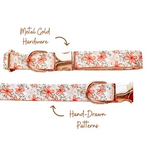 May include: Two dog collars with a floral pattern of red flowers and green leaves on a white background. The collars have metal gold hardware and hand-drawn patterns.