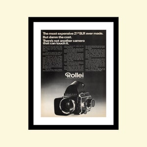 May include: A black and silver Rolleiflex SLR camera with the text "Rolleiflex" on the front. The camera is on a black background with white text that reads "The most expensive 2 1/4 SLR ever made. But damn the cost. There's not another camera that can touch it."