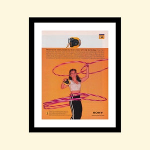 Vintage 1990s Sony Discman ad framed, retro CD music player advertisement 1998 90s