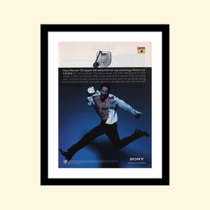 May include: A man wearing a white shirt and black trousers jumps in the air. The background is a blue gradient. The image is an advertisement for Sony Discman CD players with advanced anti-skip technology. The text on the ad reads "Sony Discman CD players with advanced anti-skip technology. Rhythm not included. No other portable CD player comes with ESP SteadySound technology. It gives you an even wider range of protection against those annoying skips. Not just the ones caused by bumping, but also the ones caused by swinging. You know, like when you walk, dance, or stumble over your own two feet. SONY sony.com/GoThere"