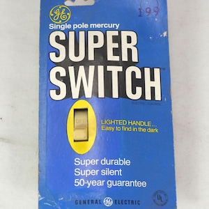 May include: A General Electric single pole mercury Super Switch in its original blue packaging. The card features white text reading Super Switch, Lighted handle... Easy to find in the dark, Super durable, Super silent, and 50-year guarantee.