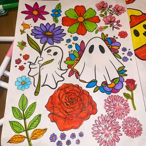 May include: A coloring page with a variety of colorful flowers, leaves, and two ghosts. The ghosts are white with black eyes and mouths. The flowers are in shades of pink, purple, red, orange, and yellow. The leaves are green and brown.