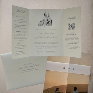 May include: Wedding invitation suite with a trifold invitation, envelope, and photo card. The invitation features a church illustration, names "Luna Rose Love and Hunter Reed Heart", and RSVP details. The envelope is addressed to "Mrs. Love and Guest".