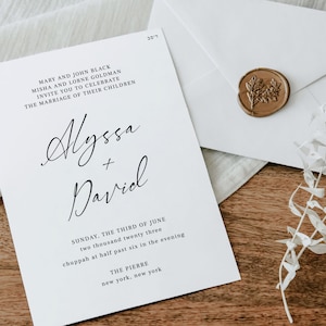 May include: Wedding invitation with white cardstock and black text. The invitation reads "Mary and John Black, Misha and Lorne Goldman invite you to celebrate the marriage of their children Alyssa + David. Sunday, the third of June, two thousand twenty three, chuppah at half past six in the evening. The Pierre, New York, New York."