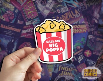 May include: A red and white striped popcorn bucket with the text "Call Me Big Poppa" in a white circle. The bucket is filled with yellow popcorn.