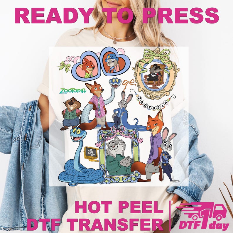 May include: A white t-shirt with a vibrant graphic of Zootopia characters. The design showcases detailed illustrations of animal characters, with the word "Zootopia" in the centre. The phrases "READY TO PRESS" and "HOT PEEL DTF TRANSFER" are also printed on the shirt.