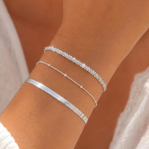 Driedelige zilveren armbandenset voor dames – tennisarmband, slangenarmband en delicate schakelarmband – roestvrijstalen sieraden, een perfect cadeau voor vrouwen