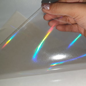 Hoja A4 de película de superposición autoadhesiva transparente holográfica de arco iris de aceite vertical - Adhesivo holográfico de vinilo