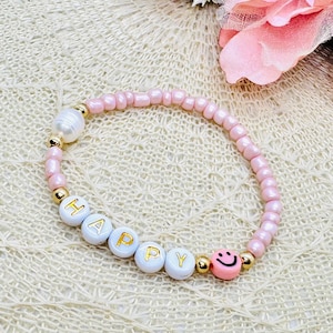 Pulsera personalizada de perla sonriente con perla de agua dulce - pulsera con letras en diferentes colores