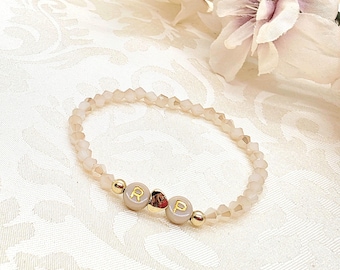Personalized pearl bracelet two-tone with heart gold-plated - beige bracelet with letter