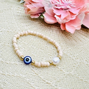 Pulseira de pérolas Evil Eye com pérola de água doce incluindo cartão de amuleto da sorte - Pulseira de amuleto da sorte Nazar
