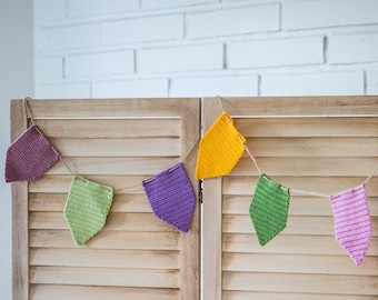 Crocheted multi-colored garland of flags