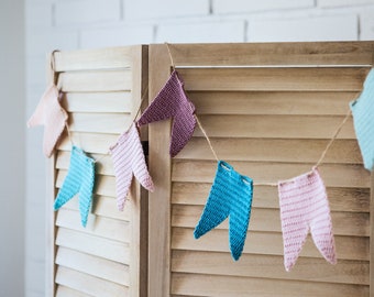 Crocheted multi-colored garland of flags