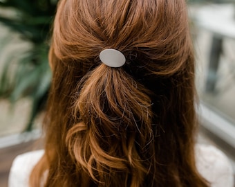 Haaraccessoires / haarspelden / haarspeldjes / haaraccessoires / haarjuwelen in de vorm van een haarelastiekje in de vorm van een ovaal, kleur staal, eenvoudig en elegant sieraad
