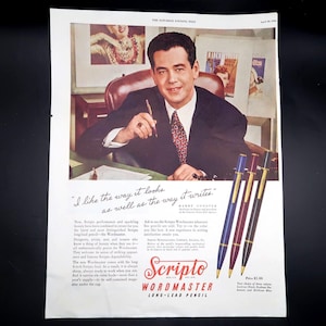 May include: A black and white advertisement for Scripto Wordmaster Long-Lead Pencils. The ad features a man in a suit holding a Scripto Wordmaster pencil and a quote from actor Barry Cosgrove, "I like the way it looks as well as the way it writes." The ad also shows three Scripto Wordmaster pencils in red, blue, and black. The price is $1.00.