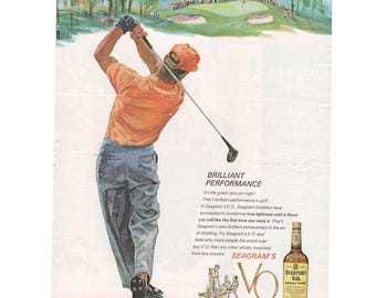May include: Vintage advertisement featuring a golfer in an orange shirt and gray pants swinging a golf club. The background shows a golf course with trees and spectators. A bottle of Seagram's V.O. Canadian Whisky is also displayed.