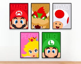 May include: Set of five framed art prints featuring characters from the Super Mario video game series. Each print has a solid color background with a character's face and name. Characters include Mario, Bowser, Toad, Peach, and Luigi.