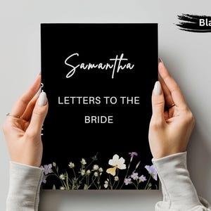 May include: A black card with the name "Samantha" in cursive, and the text "LETTERS TO THE BRIDE" in a serif font. Floral illustrations in white, purple, and yellow adorn the bottom. The word "Black" is written in a brushstroke.