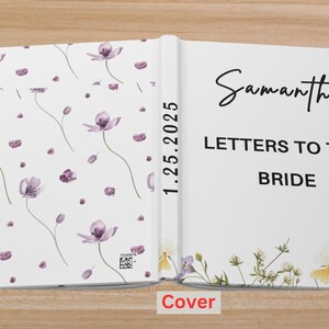 May include: Open journal with a floral design. The left side features a white background with purple flower illustrations. The right side reads "Samantha Letters to the Bride" in black script. The spine has the date 1.25.2025.