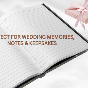 May include: An open lined journal with the text "PERFECT FOR WEDDING MEMORIES, NOTES & KEEPSAKES". A wrapped gift with a pink ribbon sits in the background. The journal has a black spine and floral design.