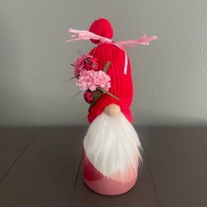 Cheerful Gnome with Red Knit Hat Decorated with Pink Carnations and Ladybugs, Whimsical Gnome, Garden Lover Gift