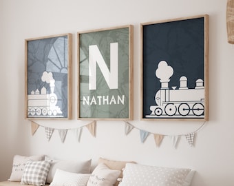 May include: A light wood storage bench with white bins and a giraffe toy. Three framed prints with a train, the letter N, and the name Nathan are hung on the wall above the bench.