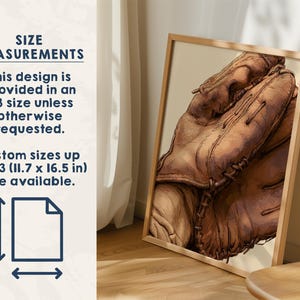 May include: A framed print featuring a detailed illustration of a brown leather baseball glove. Text on the left states: SIZE MEASUREMENTS. This design is provided in an A3 size unless otherwise requested. Custom sizes up to A3 (11.7 x 16.5 in) are available.