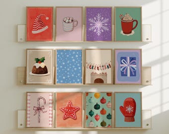 May include: A collection of framed Christmas-themed art prints. The prints feature festive illustrations such as a Santa hat, snowflake, hot cocoa, Christmas pudding, gift, candy cane, gingerbread star, ornaments, and a mitten.