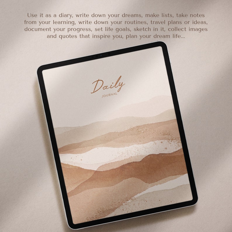 May include: A digital tablet with a brown and white watercolor background. The text "Daily Journal" is displayed on the screen.