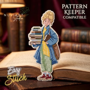 May include: A cross-stitch pattern of a person carrying books, wearing a blue coat, yellow shirt, and green pants. The text "PATTERN KEEPER COMPATIBLE" and "Easy Stitch" are visible. The design is set against a backdrop of books.