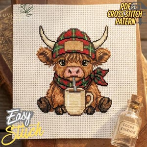 May include: Cross-stitch pattern featuring a Highland cow wearing a plaid hat and scarf, sipping from a mug. The text "PDF Cross Stitch Pattern" is visible. The words "Easy Stitch" are also present.