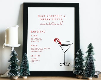 May include: A framed bar menu with the text "HAVE YOURSELF A MERRY LITTLE cocktail." The menu lists beer, wine, and spirits. A martini glass with a candy cane is drawn on the right. Miniature Christmas trees and a candle are in the foreground.