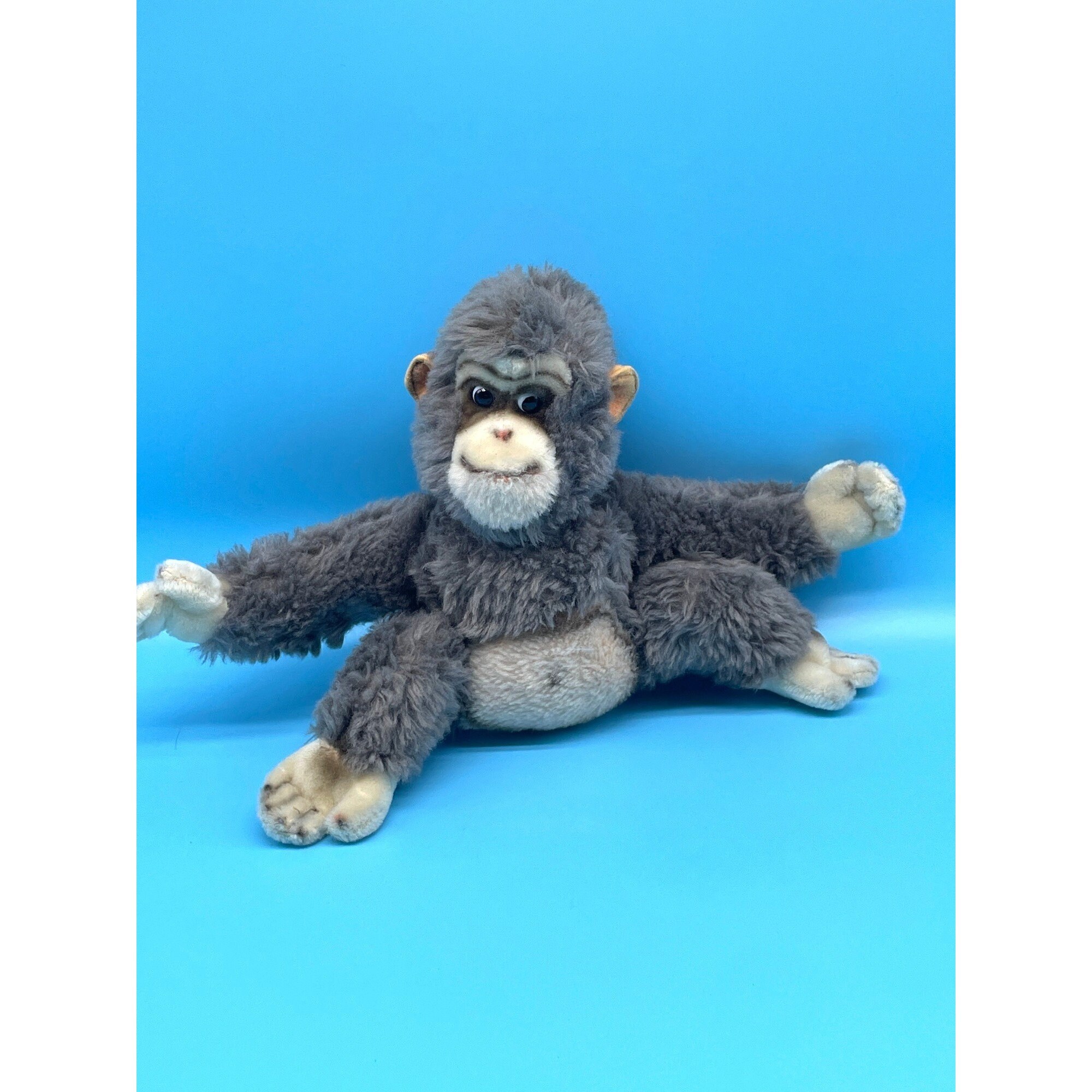 gray stuffed monkey