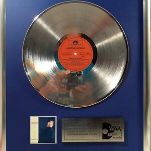 Collage with Agnetha Fältskog - Eyes of a Woman + silver / gold record