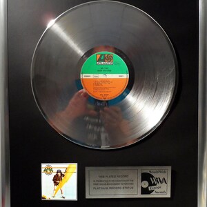 Collage with AC/DC ACDC - High Voltage + silver / gold record