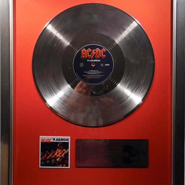 Collage with AC/DC - 74' Jailbreak + silver / gold record