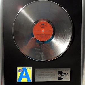 Collage with ABBA - A for Abba + silver / gold record