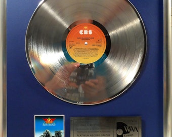 Collage with Aerosmith - Rock in a hard Place + silver / gold record