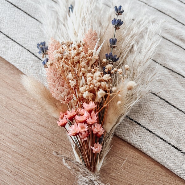 Small vase of dried flowers