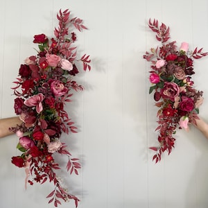 Wedding Arch Arrangements With Burgundy, Red, Pink and Dusty Rose faux flowers, dusty rose magenta floral arbor arrangements, arch decor