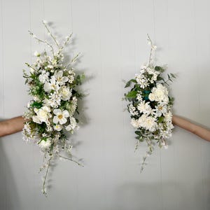 Spring Arch Arrangements With Faux Cosmos Flowers , Daisies and White faux flowers, summer wedding floral arbor arrangements, meadow arch