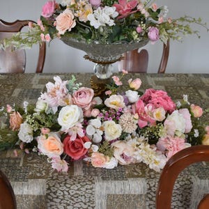 Pink Arch Arrangements With Faux Flowers, Summer Wedding Arrangements, wild flowers arbor arrangements, meadow arch decor, wedding swag