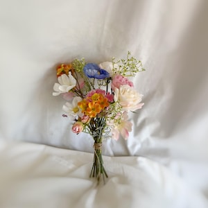 Wholesale Wedding Centerpieces, Bunches of faux flowers in blush pink, blue, orange colors for table decorating wedding table centerpiece