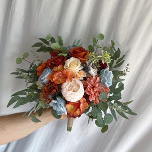 Faux bridal bouquet with rust orange and dusty blue flowers and eucalyptus, bridesmaids bouquet, terracotta bouquet, brown and blue bouquet,