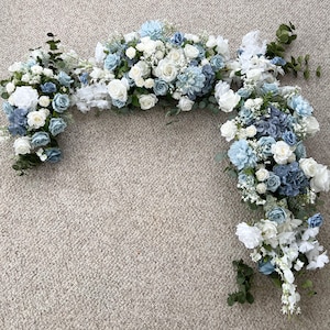 Wedding Arch and Sweetheart Arrangements With Dusty Blue and White faux flowers, dusty blue floral arbor arrangements, blue wedding flowers