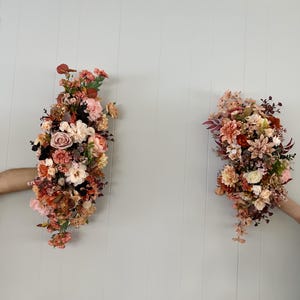 Wedding Arch Arrangements With Rust Orange, Dusty Rose and Terracotta faux flowers, rust orange and gold floral arbor arrangements,