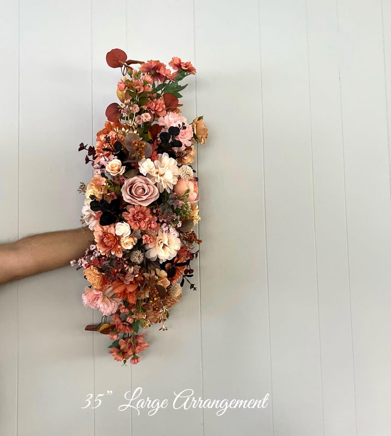 Wedding Arch Arrangements With Rust Orange, Dusty Rose and Terracotta