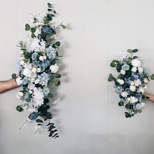 Wedding Arch Arrangements With Dusty Blue and White faux flowers, dusty blue and white floral arbor arrangements, wedding arch flowers