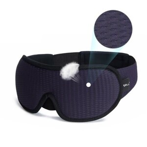 May include: Black sleep mask with a textured, breathable fabric. The mask has a contoured shape and an adjustable strap. The mask is designed to block out light and promote sleep.