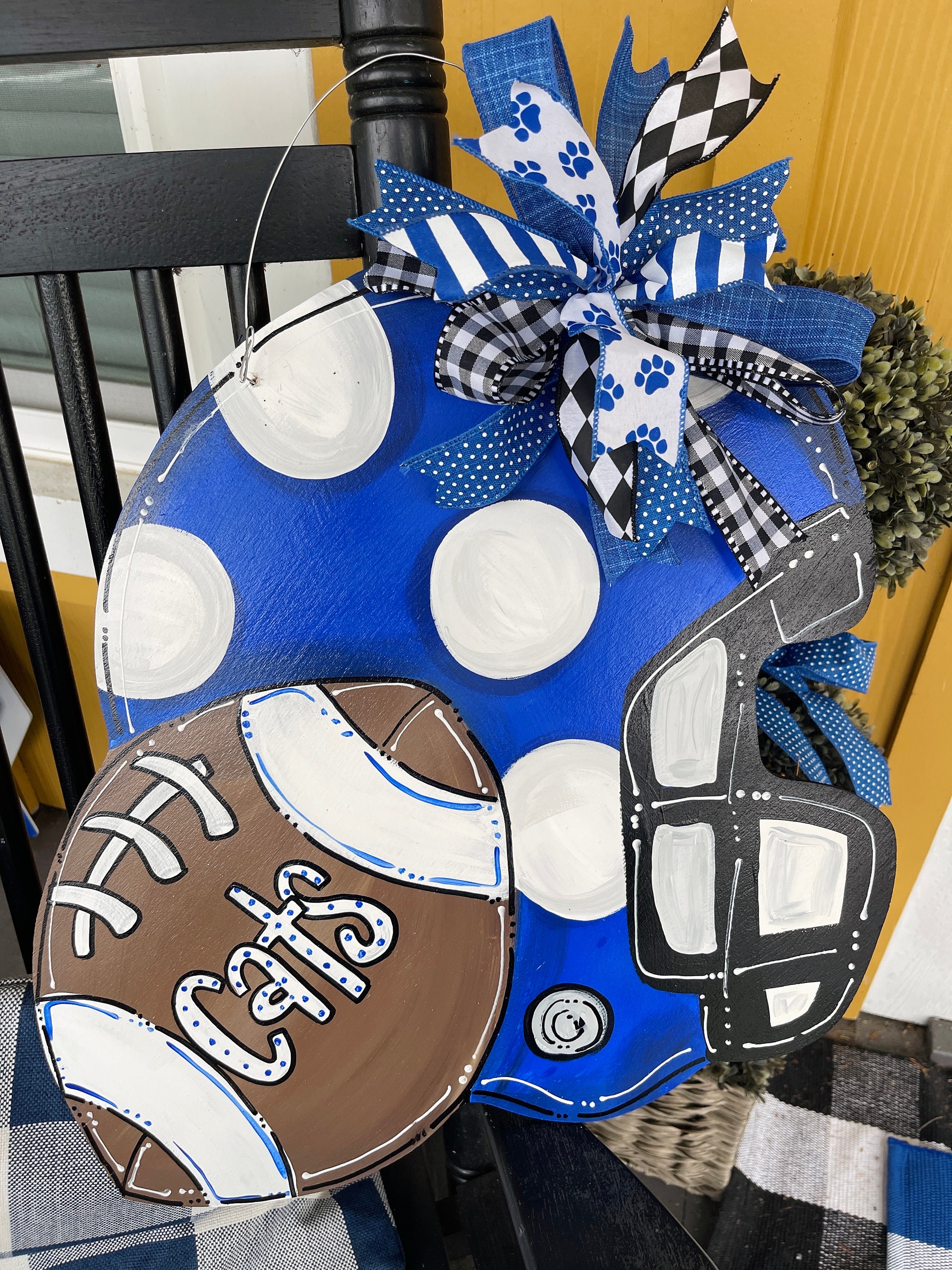 Football helmet wooden door hanger